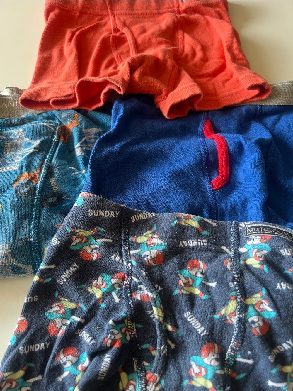 Carter's Boys 4-Pack Boxer Briefs in Blue, Navy, Orange and Multicolor Print